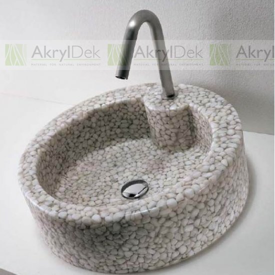 Wash-basin and sink made of pebble stone in resin